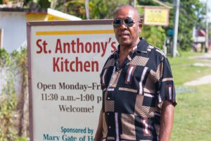 Winston Wellington next to sign