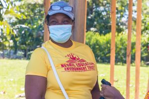 Woman Smiling in Mask