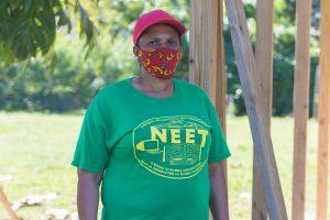 Women looking into camera with mask on